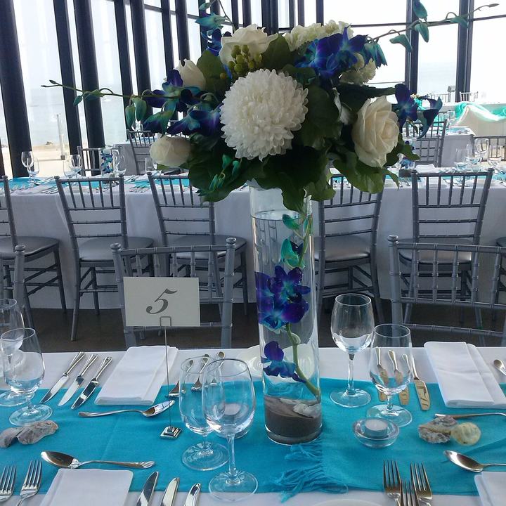 Blue orchid centerpiece, teal runner