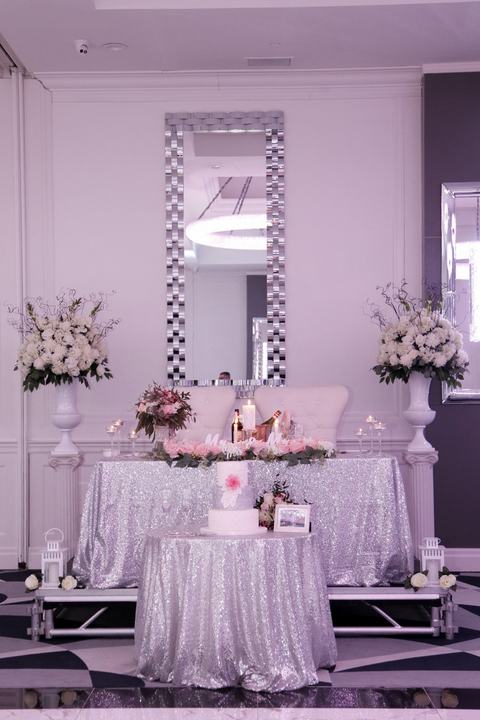 Silver sequin sweetheart table with mirrors