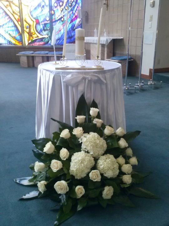 Church: unity candle table white rose arrangement