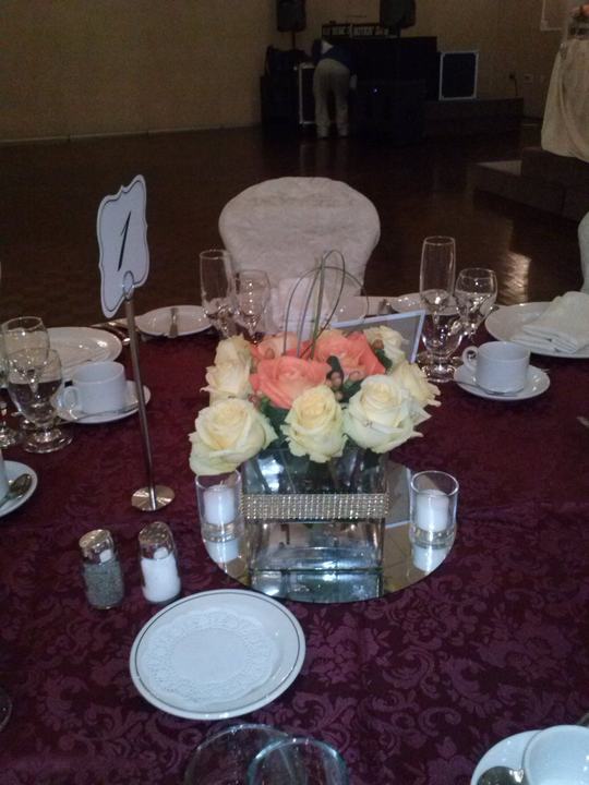 Rose centerpiece purple linen
