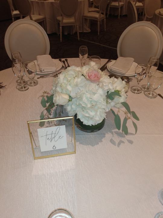 Table 6 white hydrangea centerpiece gold frame number