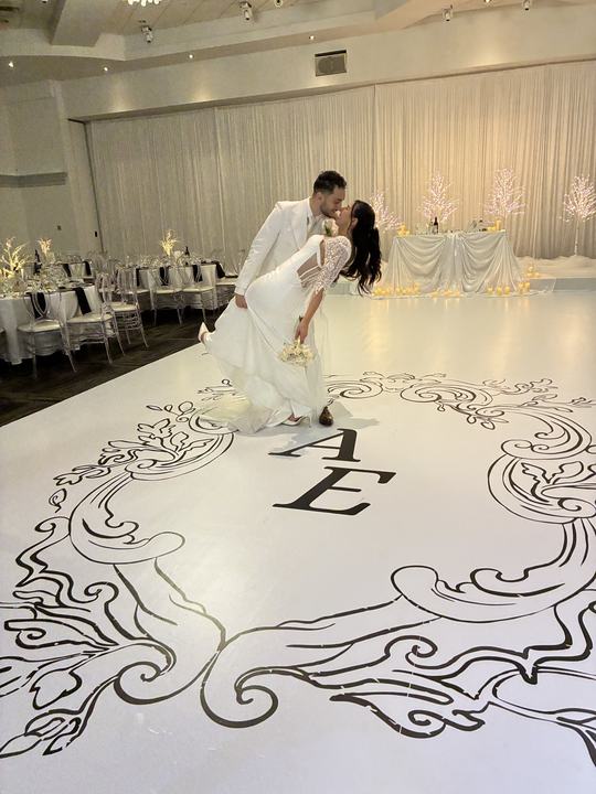 First dance on an 'AE' monogram floor wrap