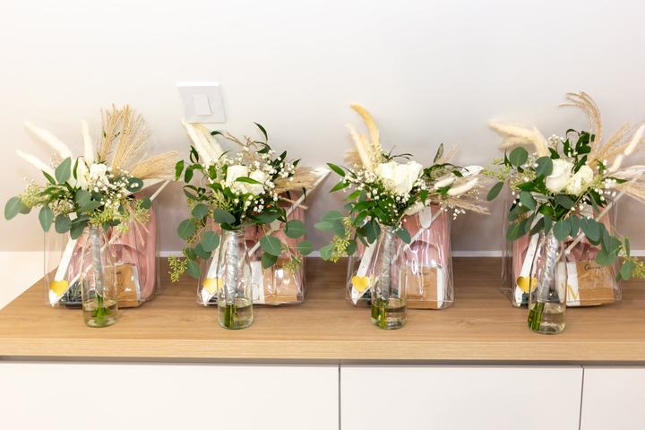 Pampas and white florals jars on shelf