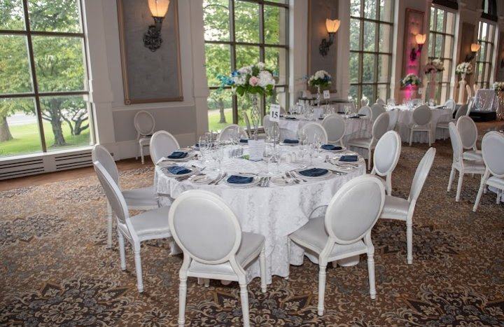Room with windows white chairs