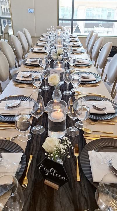 Long table black runner gold cutlery